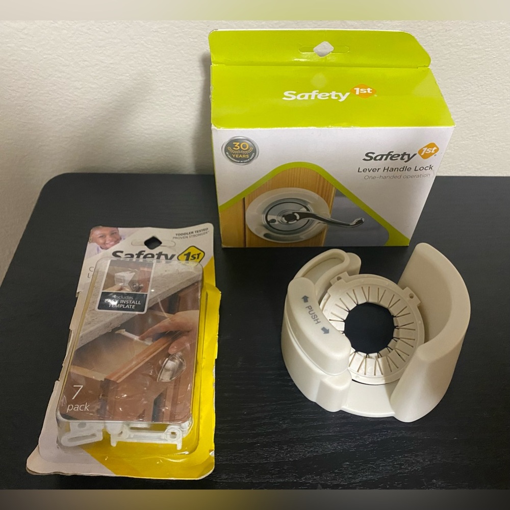 A few Safety 1st Baby Lever Handle Lock and cupboard locks